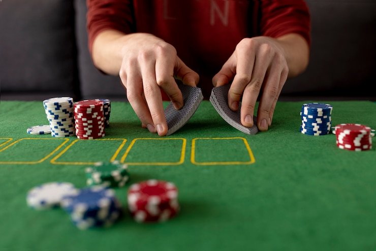 iOS portrait layout Free Bet Blackjack interface on iPhone showing dealer and betting controls